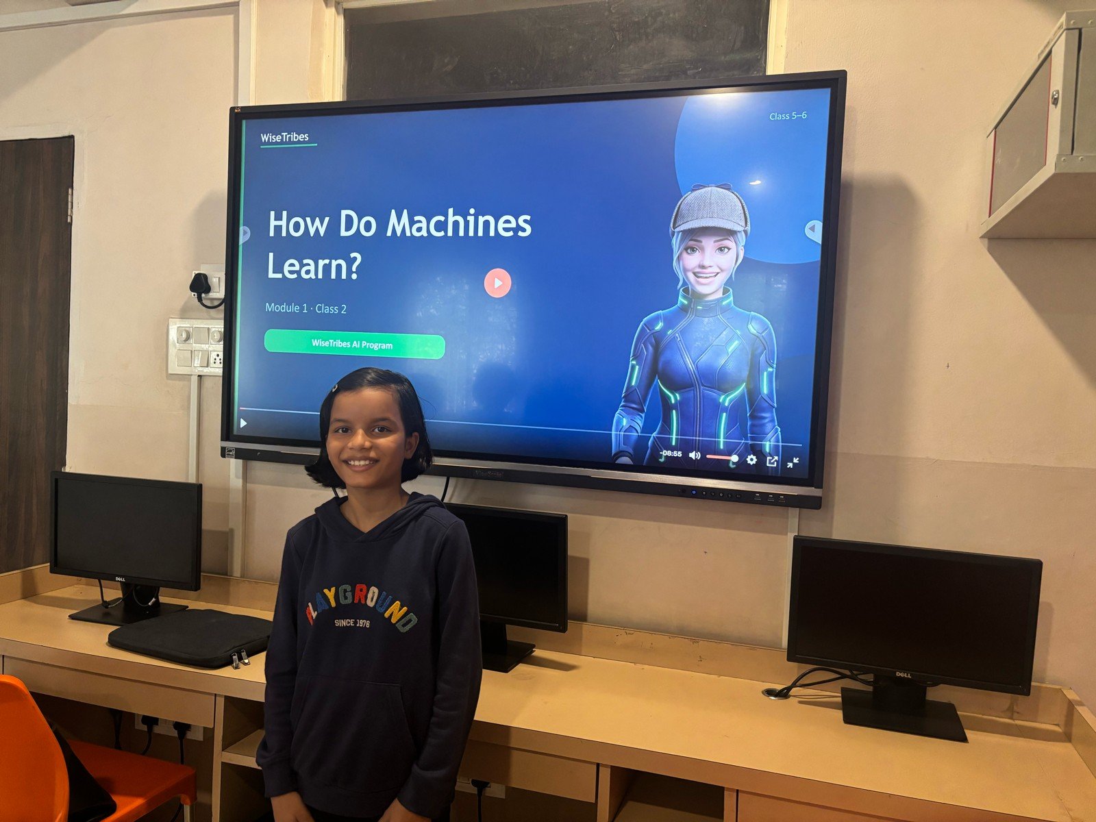 Students building solutions in class
